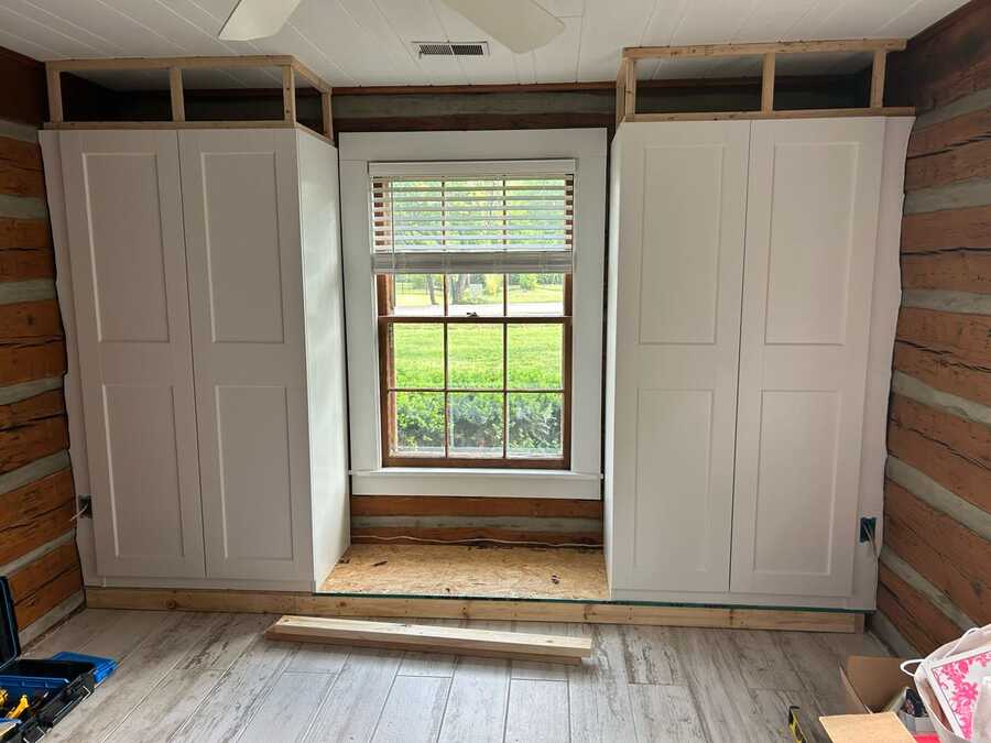 White built-in cabinet project before final trim and paint finish
